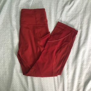 dark red lululemon mid length leggings